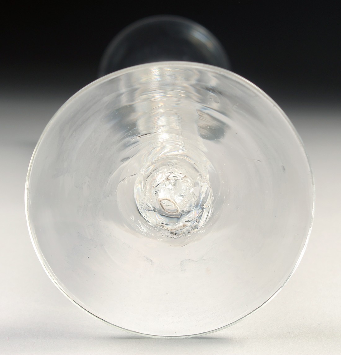 AN 18TH CENTURY TALL PLAIN ALE GLASS with air twist stem. 7.75ins high. - Image 4 of 4