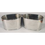 A PAIR OF OVAL CHAMPAGNE COOLERS. 16ins wide.