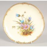 A ROYAL CROWN DERBY COMPORT painted with flowers and raised gold and platinum leaves, circa. 18810.