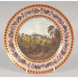 AN 18TH CENTURY ENGLISH PORCELAIN PLATE painted with a stately residence.