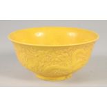 A CHINESE YELLOW PORCELAIN DRAGON BOWL 6ins diameter.