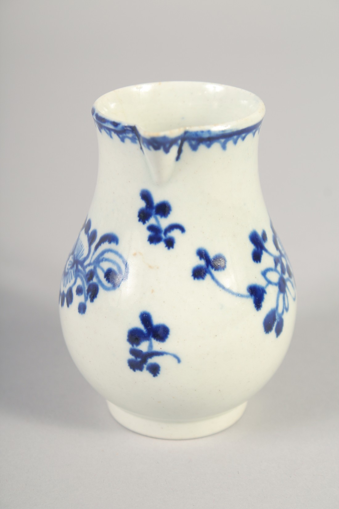 AN 18TH CENTURY LIVERPOOL JUG painted in underglaze blue with flowers with external line and loop - Image 2 of 6