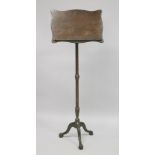 A GOOD TALL GEORGIAN MAHOGANY MUSIC STAND with shaped platform, on a slender fluted support with