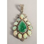 AN OPAL EMERALD AND DIAMOND SET PENDANT.