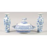 A BLUE AND WHITE SQUARE PORCELAIN TUREEN AND COVER. and a small pair of blue and white vases.
