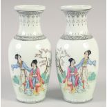 A PAIR OF REPUBLIC PORCELAIN VASES painted with girls. 8ins high.