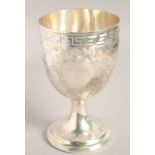 A GOOD BRIGHT CUT SILVER GOBLET with key pattern, acanthus and other decoration. 7ins high.