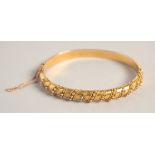 A 15CT GOLD BANGLE.12gms.