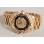 A SUPERB 18K GOLD DIAMOND SET DAY DATE WRISTWATCH, complete with invoice account from Watches of