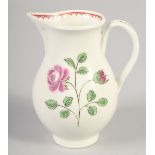 AN 18TH CENTURY WORCESTER JUG painted with a rose and rose bud with internal line and loop border.