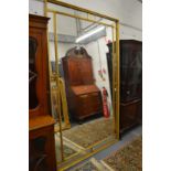 A GOOD LARGE GILT FRAMED RECTANGULAR MIRROR. 7ft 6ins x 4ft 6ins.