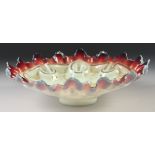A 19TH CENTURY FRENCH OPALINE CIRCULAR DISH painted with garlands. 10.5ins diameter.