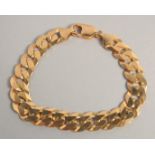 A 9CT GOLD BRACELET. 28gms.