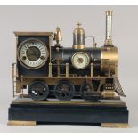 A GOOD BRONZE TRAIN CLOCK on a stand with three dials. 16ins long.