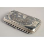 A GOOD RUSSIAN SILVER NIELLO CASE the lid engraved with figures. 3.75ins long. Mark: 13C over