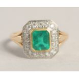 AN 18CT YELLOW GOLD COLUMBIAN EMERALD AND DIAMOND RING.