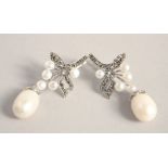 A PAIR OF SILVER MARCASITE AND PEARL EARRINGS