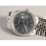 A ROLEX DATE JUST STAINLESS STEEL WRISTWATCH in original box.