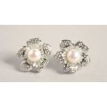 A PAIR OF SILVER PEARL EARRINGS.