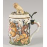 A CAPODIMONTE PORCELAIN TANKARD AND COVER.