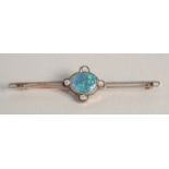 A BLACK OPAL AND DIAMOND BAR BROOCH.