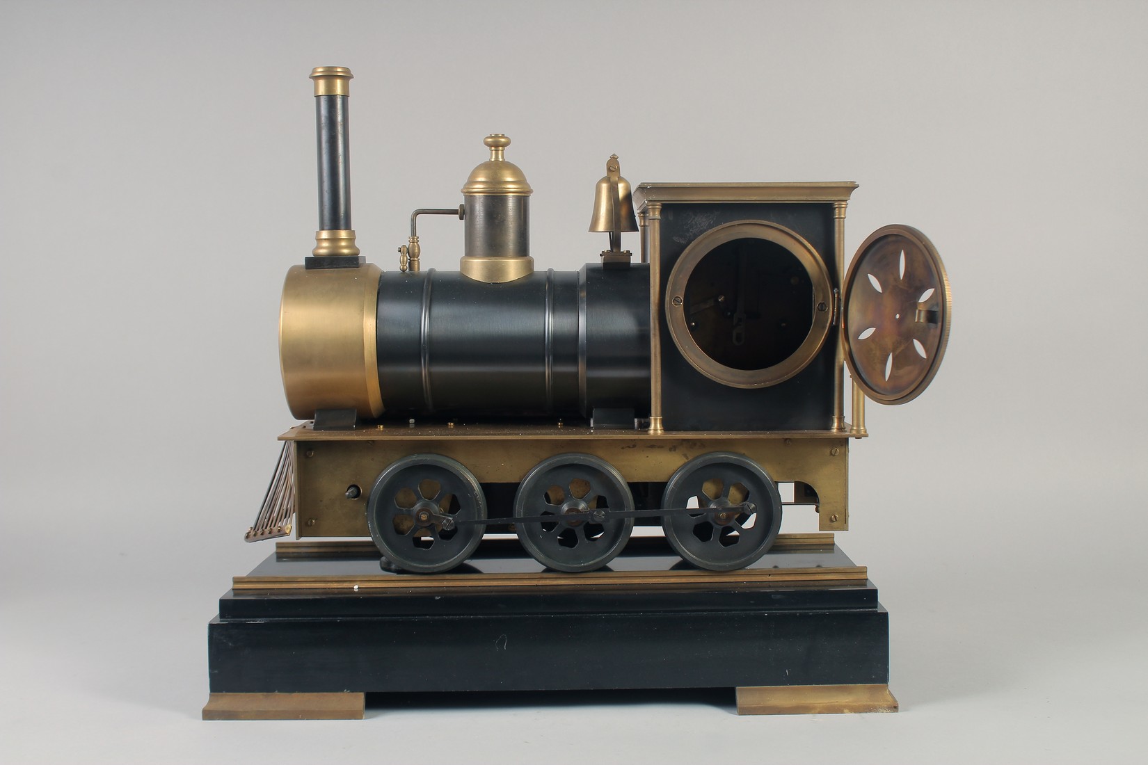 A GOOD BRONZE TRAIN CLOCK on a stand with three dials. 16ins long. - Image 6 of 6