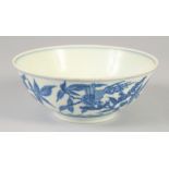 A CHINESE BLUE AND WHITE PORCELAIN BOWL with floral decoration and birds, six character mark to