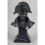 A BRONZE BUST OF NAPOLEON on a marble base. 14ins high.