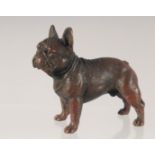 A CAST BRONZE MODEL OF A DOG. 7.5cm long.