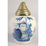 A DUTCH DELFT VOC LARGE TOBACCO JAR painted in blue with a smoking man seated next to a tobacco