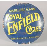 A ROYAL ENFIELD CYCLES ENAMEL SIGN. 11.5ins diameter.