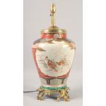 A GOOD MID 20TH CENTURY KUTANI PORCELAIN LAMP painted with birds with ormolu base. 16ins high.