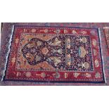 AN UNUSUAL PERSIAN CARPET, rich ground and deep red border, all with Persian and Islamic bowls,
