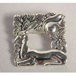 A STERLING DANISH SILVER BROOCH, SQUIRREL AND DEER.