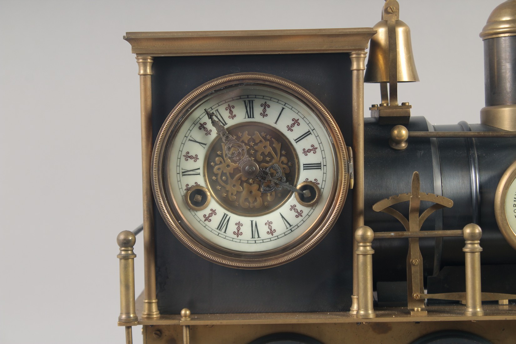 A GOOD BRONZE TRAIN CLOCK on a stand with three dials. 16ins long. - Image 2 of 6