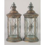 A PAIR OF CIRCULAR COPPER LANTERNS.