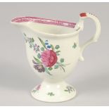 An 18TH CENTURY LIVERPOOL JUG painted with scattered spray and sprigs of flowers with internal