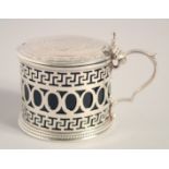 A VICTORIAN CIRCULAR PIERCED MUSTARD POT AND COVER with handles and sapphire blue liner.