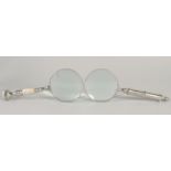 TWO MAGNIFYING GLASSES with mother of pearl and chrome handle.