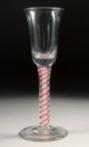 A DUTCH WINE GLASS with coloured twist stem 5.25ins high.