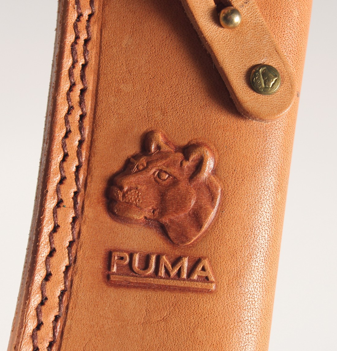 A PUMA WHITE HUNTER KNIFE 6377, with antler handle in a leather sheath, 10" long. - Image 6 of 7