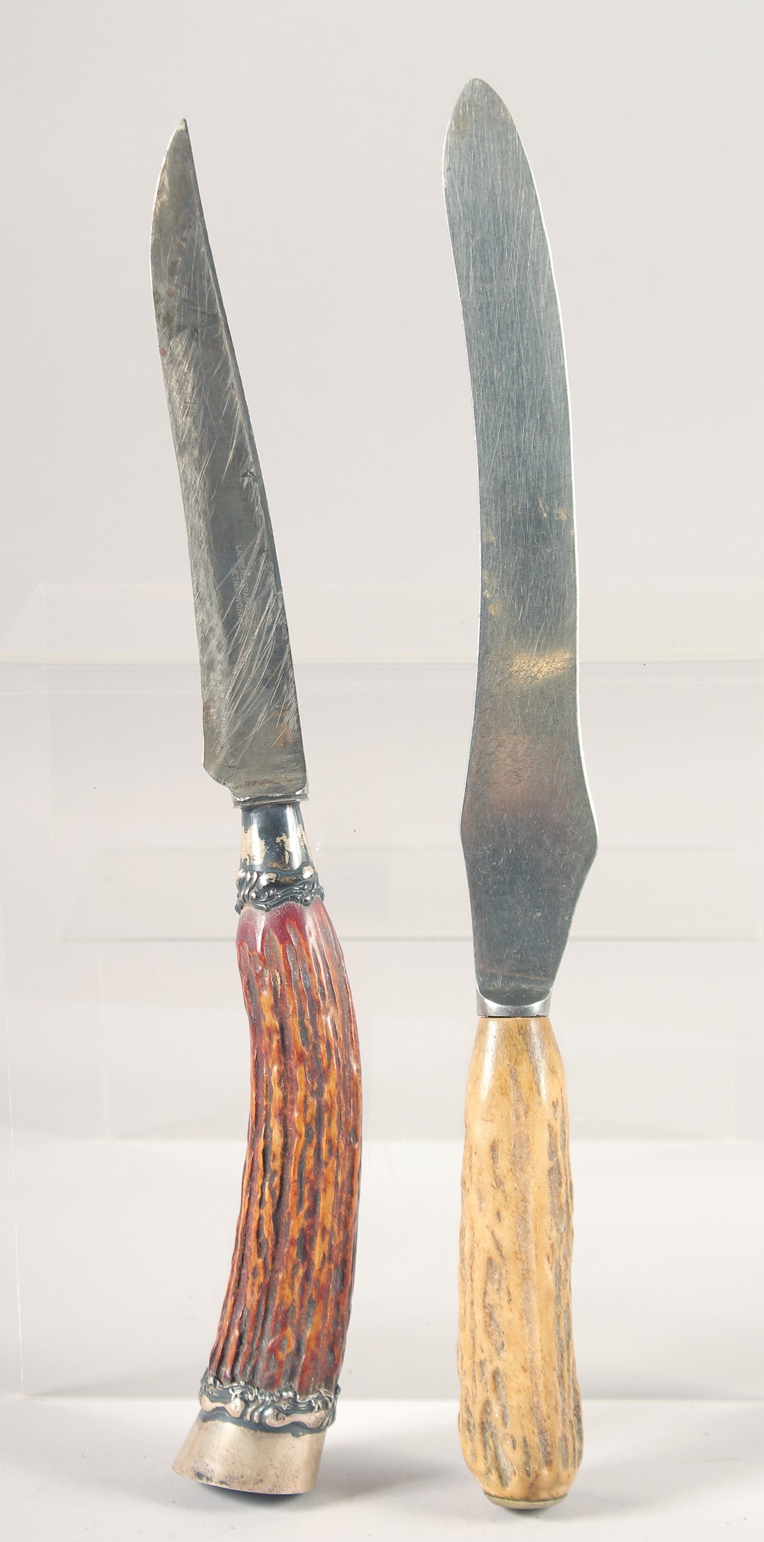TWO KNIVES, with antler handles, (2).