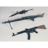 THREE MODEL 1/4 SCALE MACHINE GUNS, a Sten gun, an MG 42 and an AK 47, made of wood and metal, the