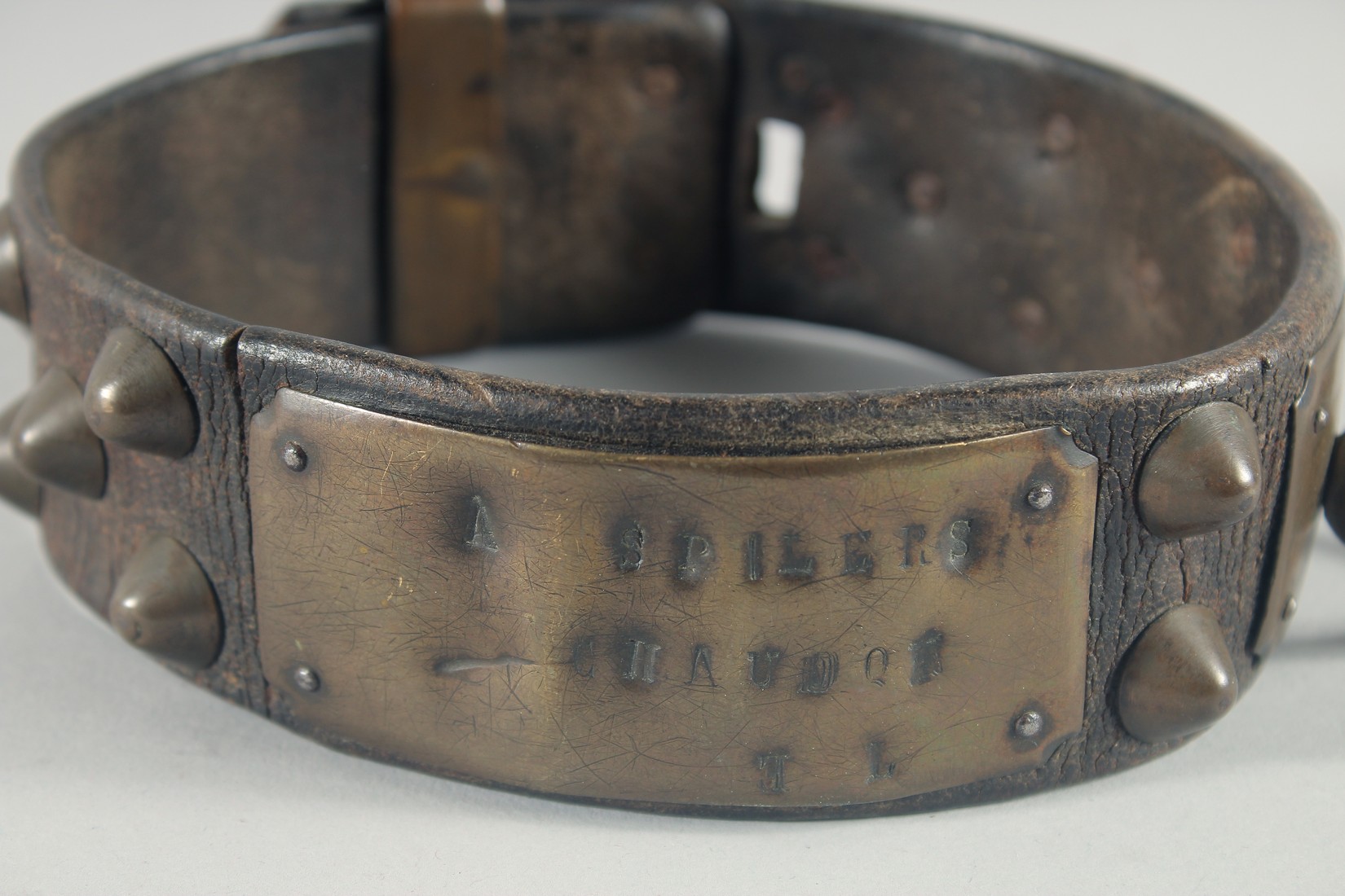 A 17th CENTURY LEATHER STUDDED BRASS DOG COLLAR, with six brass settings, stamped, possibly - Image 3 of 4