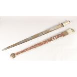 A REPLICA OF A VIKING BROAD SWORD, early 20th century, wide tapering blunt 37 in blade white horn