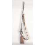 A GERMAN PERCUSSION SPORTING GUN, circa 1845, round 28 bore 32in barrels with raised rib, signed '