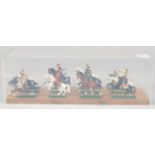 A DIECAST SET, of twelve mounted cavalry, in a Perspex case.