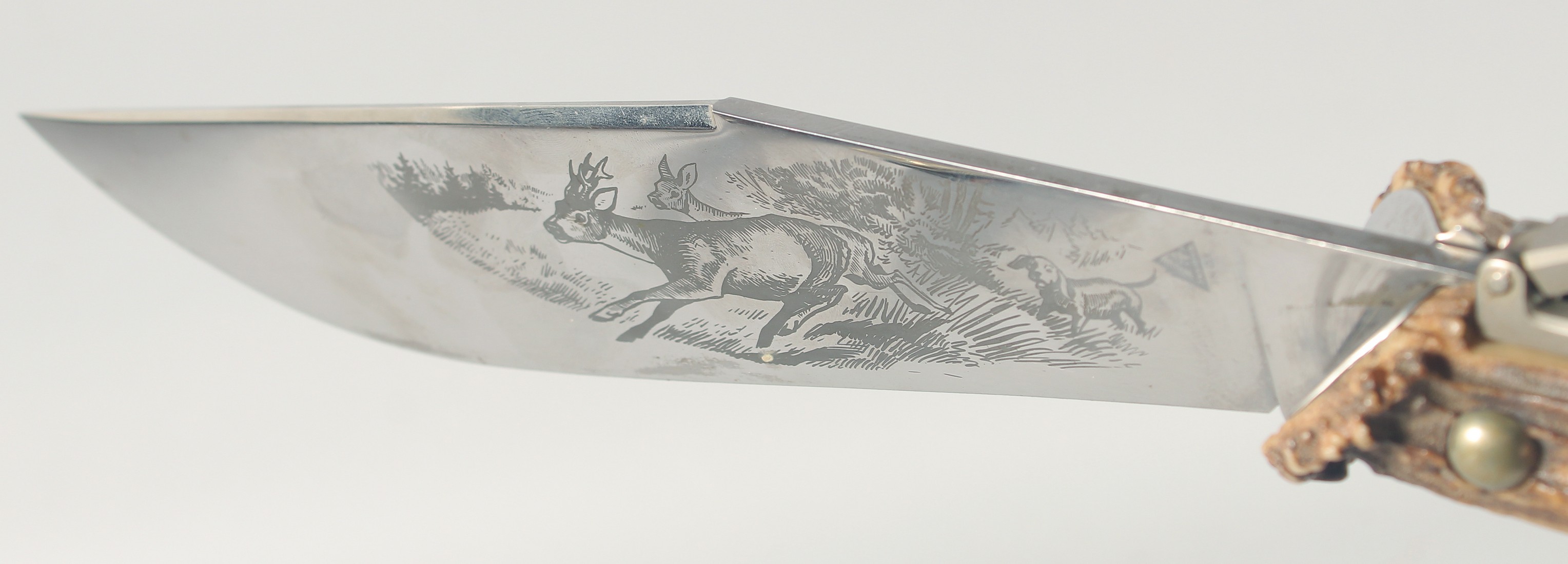 INDIANA INOX, A LARGE HUNTING KNIFE, the blade engraved with two deer and a dog, blade 12" with a - Image 2 of 7