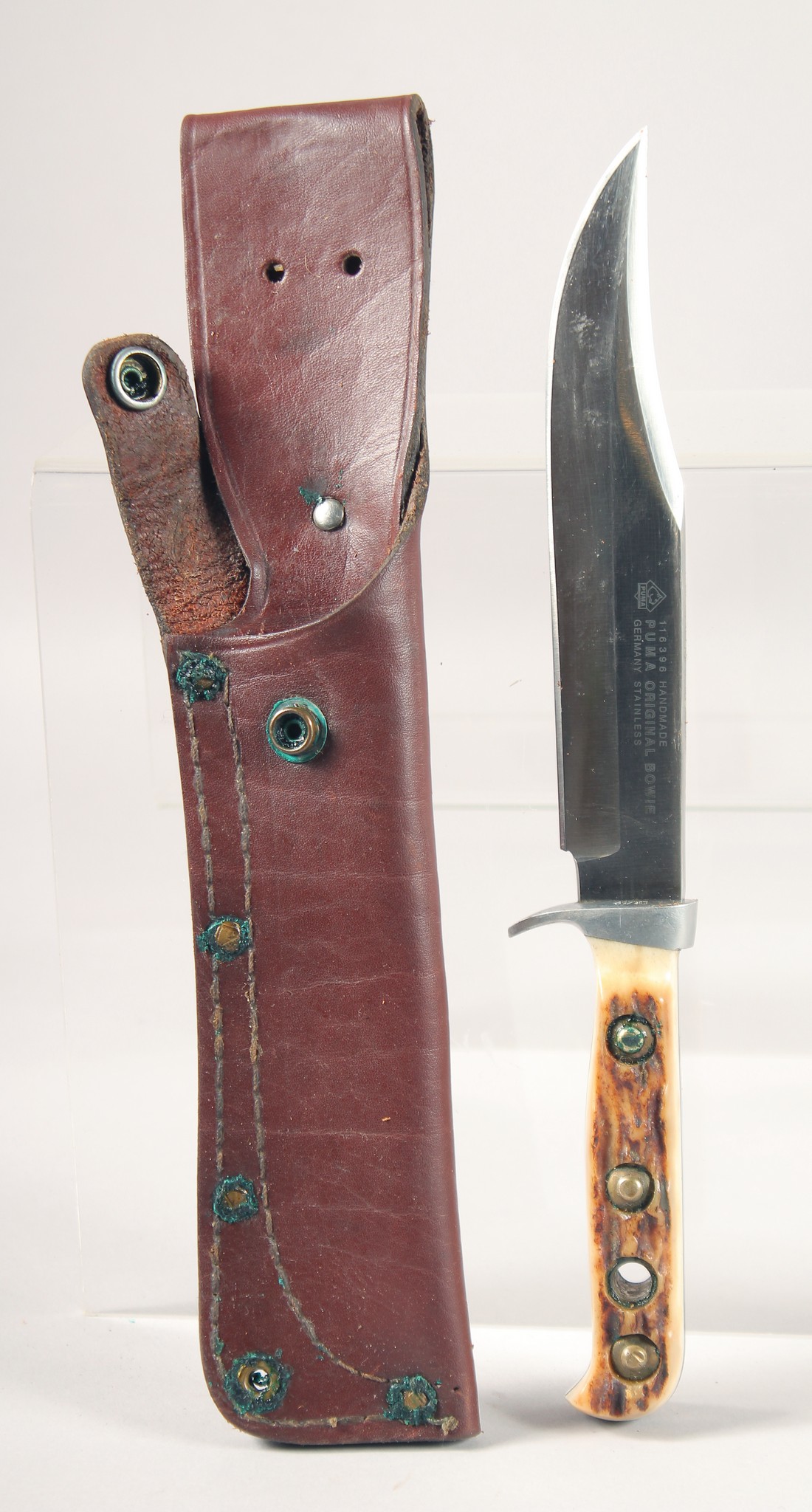 A PUMA ORIGINAL BOWIE KNIFE 116396, with stainless steel blade and antler handle, 10.5" long, in a