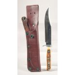 A PUMA ORIGINAL BOWIE KNIFE 116396, with stainless steel blade and antler handle, 10.5" long, in a